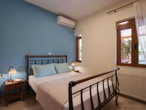 Posteľ alebo postele v izbe v ubytovaní Ageri Traditional Villa
