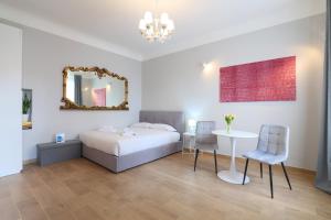 Ένα ή περισσότερα κρεβάτια σε δωμάτιο στο PrimoPiano - Meda 6