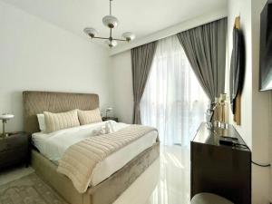 Postel nebo postele na pokoji v ubytování Dar Vacation-Luxurious 1BR Apartment in Beach Isle