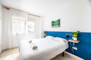 Postel nebo postele na pokoji v ubytování Apartamentos Turísticos Centro Histórico, by CartagenaSpain