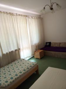 Posteľ alebo postele v izbe v ubytovaní Apart
