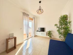 Μια τηλεόραση ή/και κέντρο ψυχαγωγίας στο Ocean Penthouse Ferrel