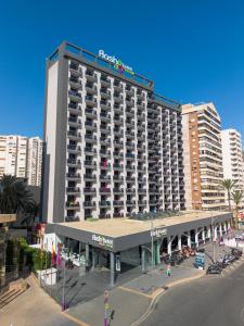 a large building with a hotel on top of it at Flash Hotel Benidorm - Recommended Adults Only 4 Sup in Benidorm