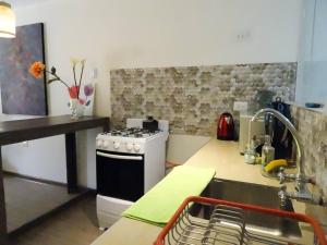 Kuchyň nebo kuchyňský kout v ubytování Casa Marbella