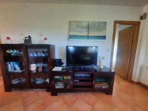 TV a/nebo společenská místnost v ubytování Casa da Xesteira-Merexo-Muxía-Costa da Morte