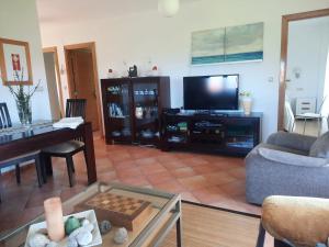 TV a/nebo společenská místnost v ubytování Casa da Xesteira-Merexo-Muxía-Costa da Morte
