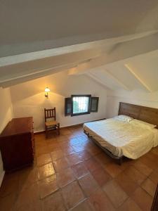 Postel nebo postele na pokoji v ubytování Cortijo Burruelo + 28 fotografií