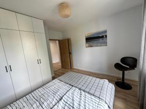 Postel nebo postele na pokoji v ubytování Rezydencja Vintage Exclusive Series II