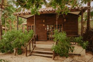 Zahrada ubytování Petit Lafitte Beach Front Hotel & Bungalows