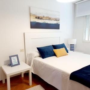Posteľ alebo postele v izbe v ubytovaní Piso Mirador playa de Coroso