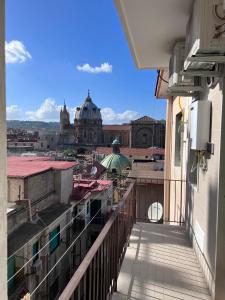 a view of a city from a balcony at Medusa Duomo Guest House in Naples