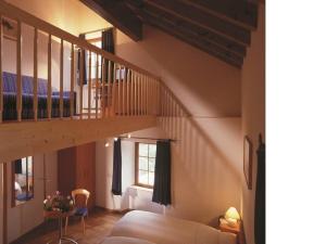 Ένα ή περισσότερα κρεβάτια σε δωμάτιο στο Hotel du Pigne