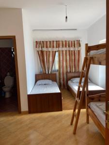 Voodi või voodid majutusasutuse Hotel Bora toas