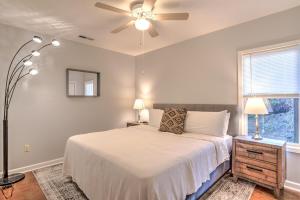 a bedroom with a bed and a ceiling fan at South Asheville Townhome 14 A in Arden