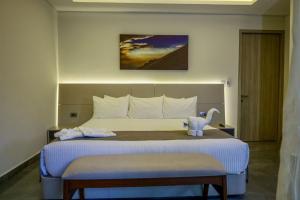 Voodi või voodid majutusasutuse Solmare Apartments & Suites toas