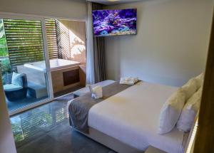 Voodi või voodid majutusasutuse Solmare Apartments & Suites toas