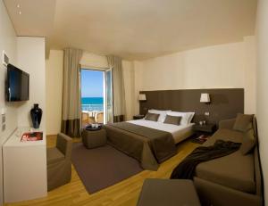 TV a/nebo společenská místnost v ubytování Hotel Miramare
