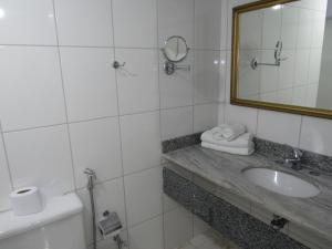Um banheiro em Hotel Nacional Inn Campinas Trevo