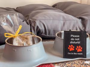 Tempat tidur dalam kamar di Hotel Villa Anita