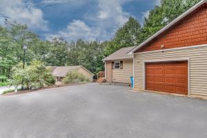 a house with a garage and a driveway at South Asheville Townhome 16 B in Arden