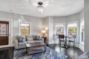 a living room with a couch and a table at 237 East Chestnut St in Asheville