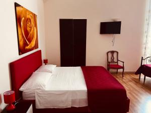 Postel nebo postele na pokoji v ubytování B&B Porta Grande