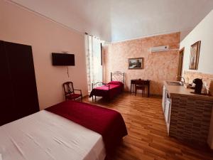 Postel nebo postele na pokoji v ubytování B&B Porta Grande