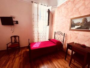 Postel nebo postele na pokoji v ubytování B&B Porta Grande