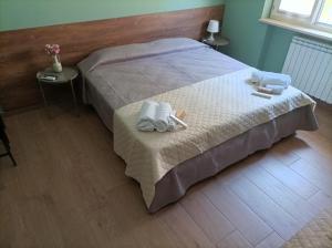 Letto o letti in una camera di INCASTRO B&B IN CROTONE