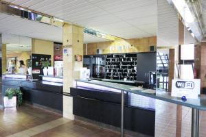The lounge or bar area at Retro Hotel Suza