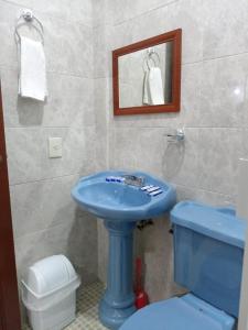 Koupelna v ubytování Orquídeas Hotel