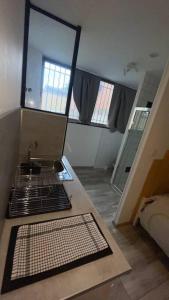 Kuchyň nebo kuchyňský kout v ubytování Logement 2 personnes.