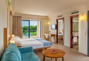 A bed or beds in a room at Ionian Theoxenia