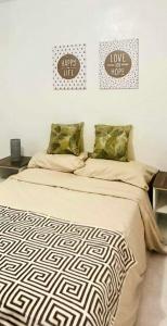 Un pat sau paturi într-o cameră la Casa Mercado I