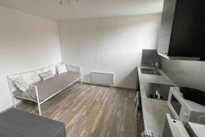 Postel nebo postele na pokoji v ubytování Logement 1 à 4 personnes