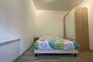 Postel nebo postele na pokoji v ubytování Logement 1 à 4 personnes