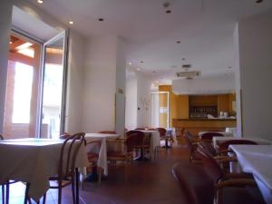Restaurant ou autre lieu de restauration dans l'établissement Albergo Italia