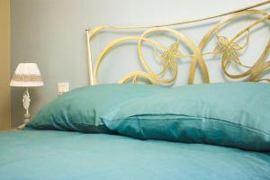 Postel nebo postele na pokoji v ubytování Bed & Breakfast Corte Toro