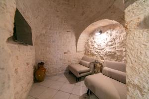 Posezení v ubytování Trullo Arboris