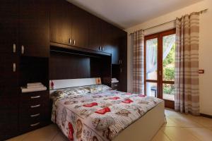 A bed or beds in a room at Casa Lilla 1 e 2