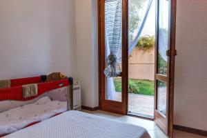 A bed or beds in a room at Casa Lilla 1 e 2