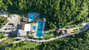 an aerial view of a house with a swimming pool at Motel "KULA" in Cazin