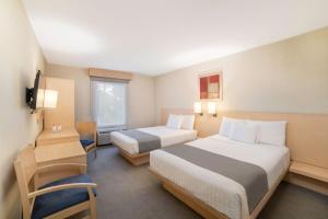 Postel nebo postele na pokoji v ubytování City Express by Marriott Tula + 37 fotografií