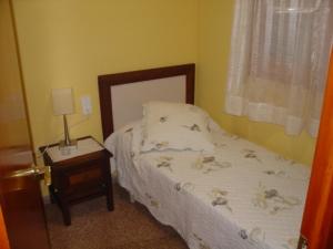 Posteľ alebo postele v izbe v ubytovaní Hostal Restaurante Arasa