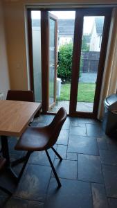 Posezení v ubytování Cosy 2 bed house + 2 fotografie