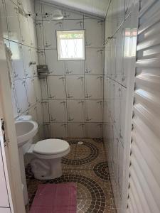 Ванная комната в Chácara Sonho Realizado