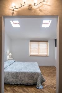Llit o llits en una habitació de Althea