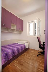 Postel nebo postele na pokoji v ubytování Cvita apartments
