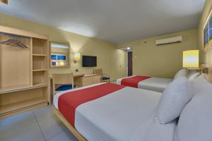 Postel nebo postele na pokoji v ubytování City Express by Marriott Campeche