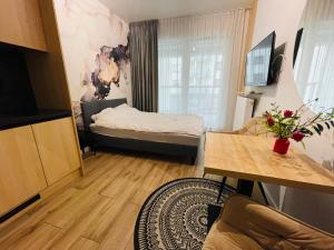 Postel nebo postele na pokoji v ubytování W Apartments + 5 fotografií